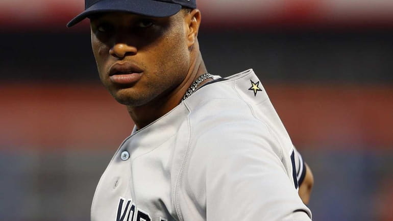 All-Star Robinson Cano looks on before the 84th MLB All-Star...