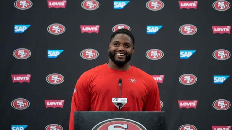 San Francisco 49ers defensive tackle Javon Hargrave speaks to reporters...