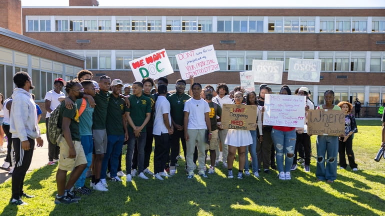 Students hold a walkout at Elmont High School in protest...