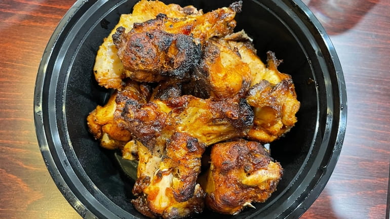 Portuguese charcoal chicken at Cookoo Rico, a new eatery in...