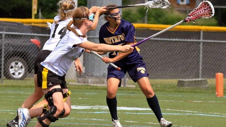 Northport's #15 Cortney Fortunato scores a goal at the NYSPHAA...