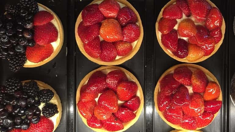 Raspberry and strawberry tarts at the French Workshop, which opened...