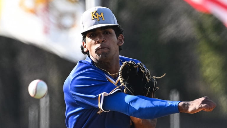 Kellenberg starting pitcher Andrew Koshy throws during a CHSAA baseball game against...