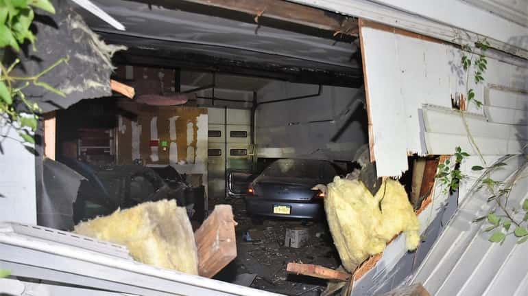 A stolen 2006 Toyota Camry crashed into Big n'Littles Auto...