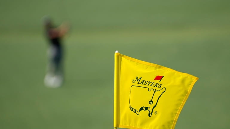 The Masters flag is displayed on the second hole during...