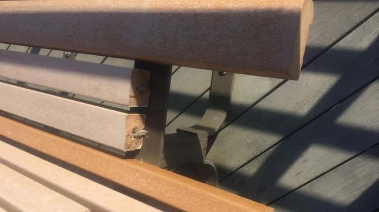 A Feb. 5 photo shows a broken Long Beach boardwalk...