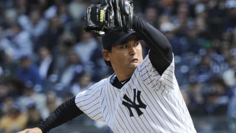 New York Yankees' relief pitcher Chan Ho Park throws against...