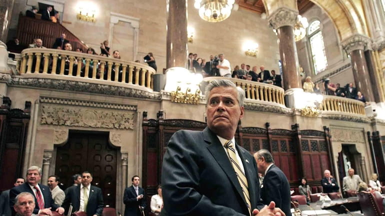 Dean Skelos, R-Rockville Centre, waits in the NY Senate chamber...