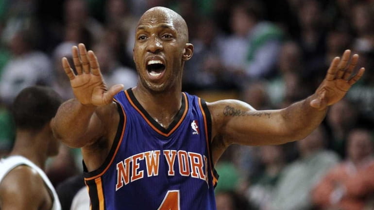 New York Knicks' Chauncey Billups shouts to his teammates during...