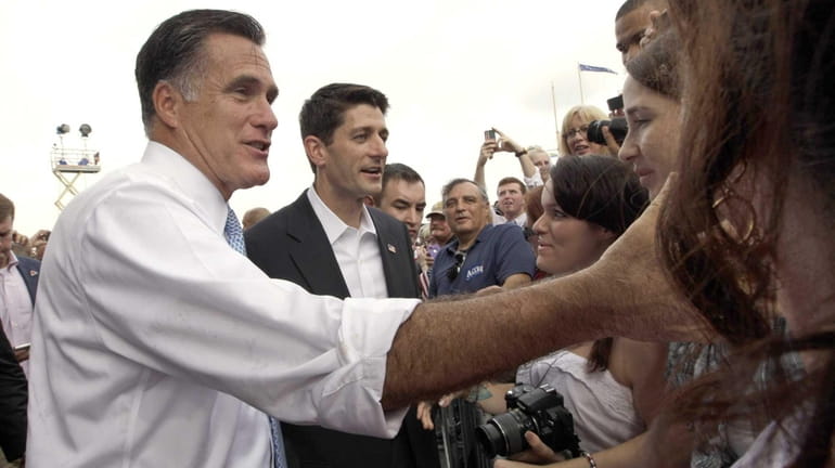 Republican presidential candidate Mitt Romney, left, and vice presidential candidate...