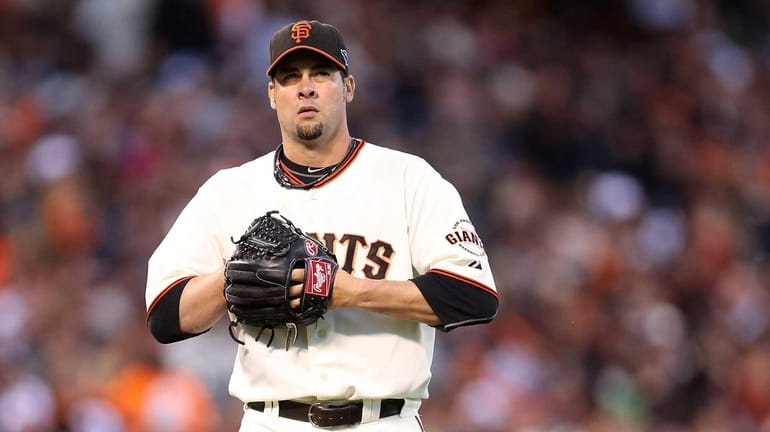 Pitcher Ryan Vogelsong of the San Francisco Giants looks on...
