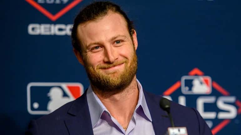 Gerrit Cole speaks to the media at a news conference...