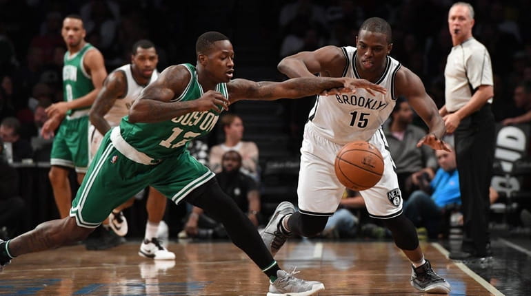Brooklyn Nets guard Isaiah Whitehead battles for the ball against...