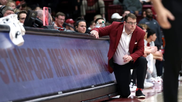 Stanford coach Jerod Haase watches the team during the first...