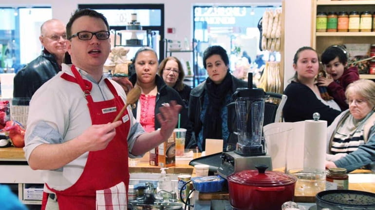 Aaron Bokros leads a free cooking class on making soups...
