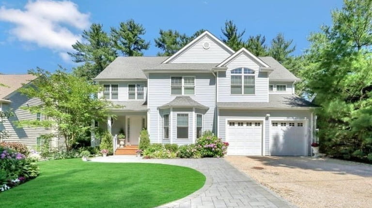 Listed for $1.499 million, this four-bedroom, 3½ bath Colonial on...