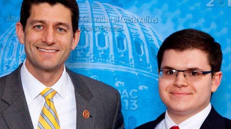 Adam Savader, right, with U.S. Congressman Paul Ryan in an...