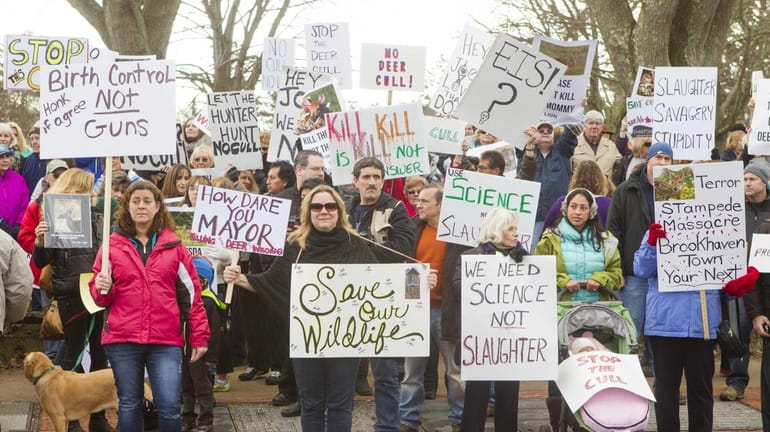 Animal advocates gather in East Hampton to demonstrate against the...