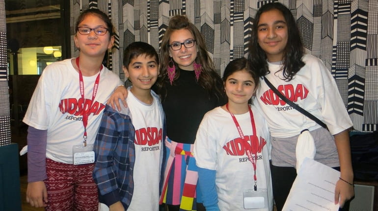 Madisyn Shipman, center, with Kidsday reporters from left, Jeanne Marie...