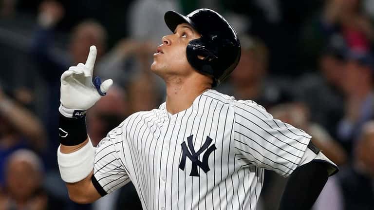 Aaron Judge of the Yankees reacts after his first-inning two-run...