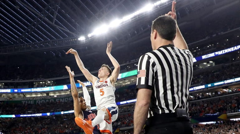 Kyle Guy #5 of the Virginia Cavaliers attempts a game-winning...