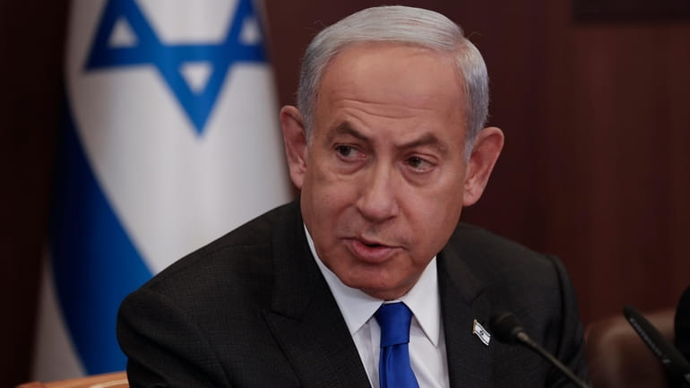 Israeli Prime Minister Benjamin Netanyahu at the weekly cabinet meeting...