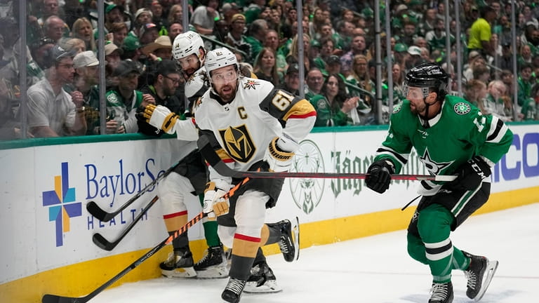 Vegas Golden Knights right wing Mark Stone (61) attempts to...