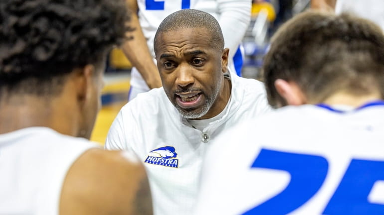 Hofstra coach Speedy Claxton speaks during a timeout against Delaware...