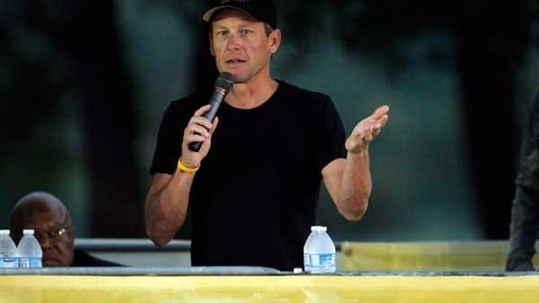 Lance Armstrong addresses participants at The Livestrong Challenge Ride, Oct....