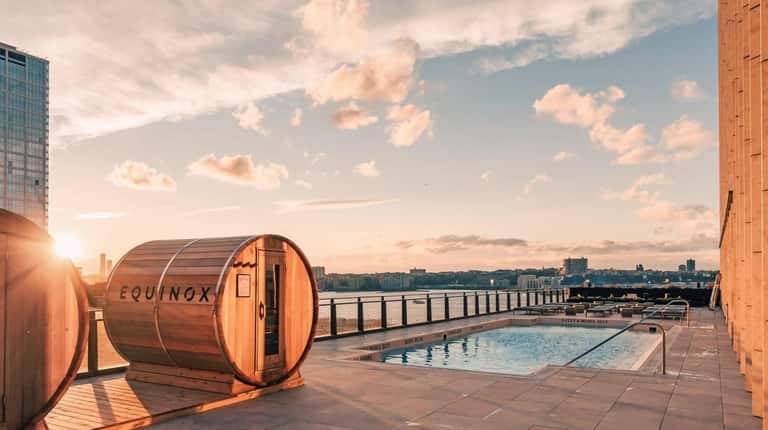 These saunas and heated pool are among the wellness amenities...