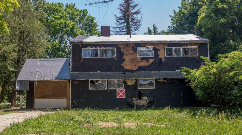 "Abandoned and foreclosed 'zombie properties' drag down surrounding home values...