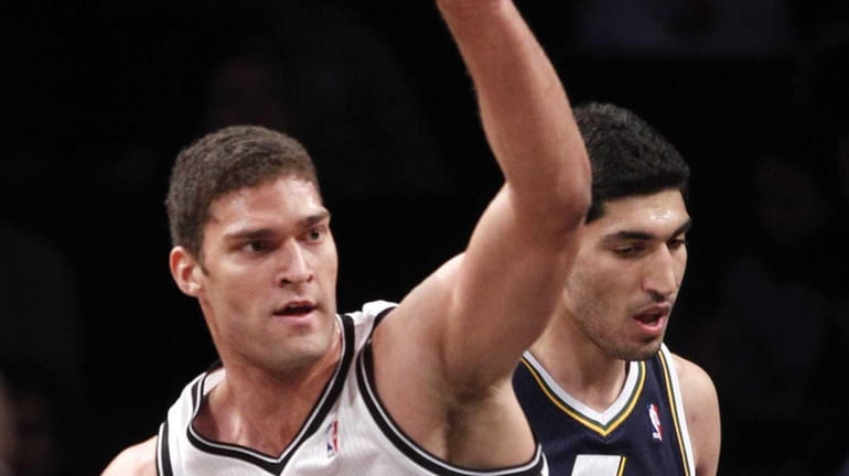 Brook Lopez reacts after scoring during a game against the...