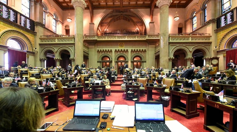 New York state Assembly members during session in the Assembly Chamber...
