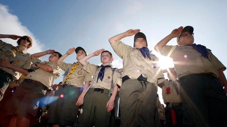Boy Scouts salute during New Jersey's Boy Scouts Camporee in...