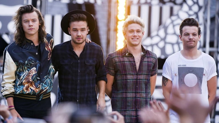 One Direction members, from left, Harry Styles, Liam Payne, Niall...