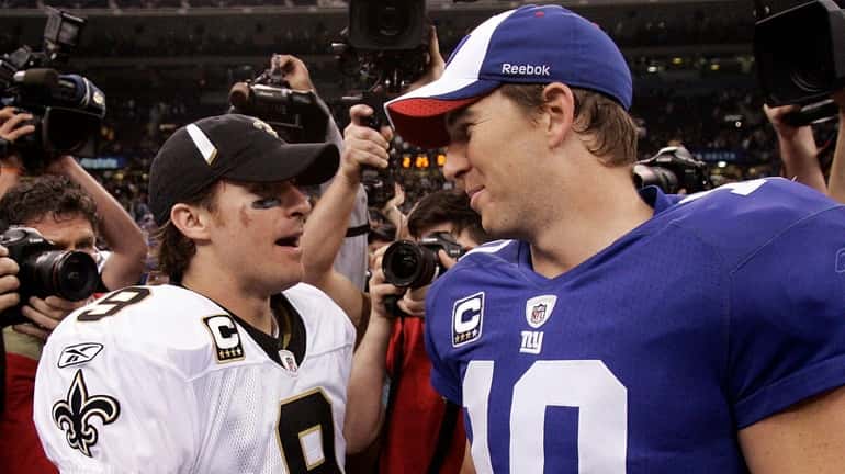 Drew Brees and Eli Manning after the Saints' 48-27 victory...
