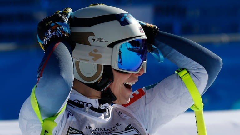 Norway's Ragnhild Mowinckel reacts after winning an alpine ski, women's...