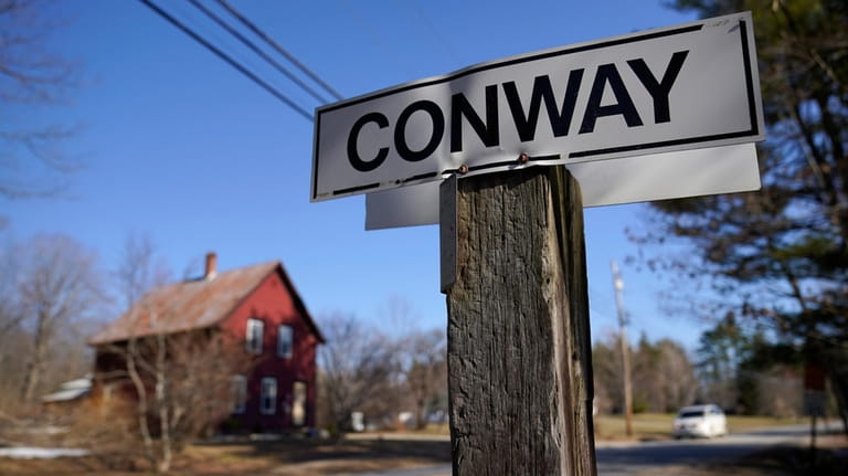 A sign marks the southern border of rural Conway, N.H.,...