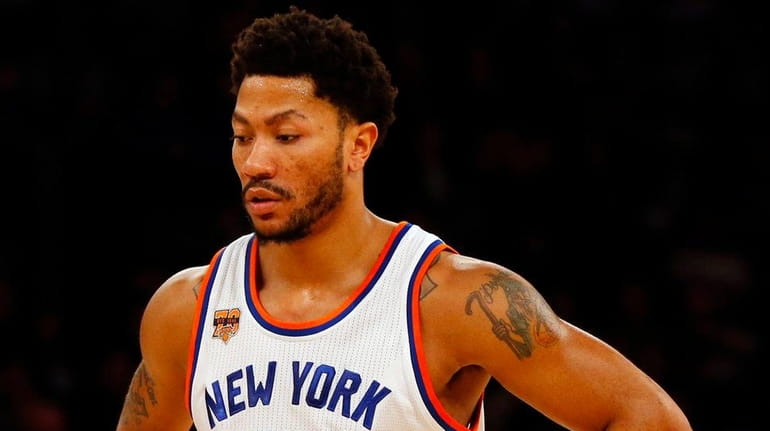 Derrick Rose of the Knicks looks on during the second...
