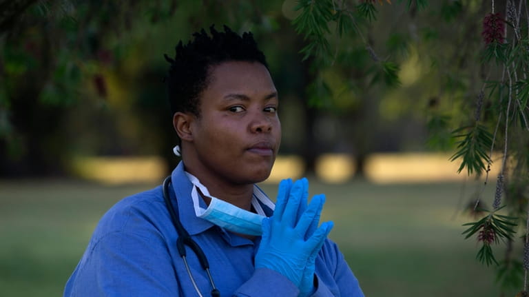 South African doctor Zolelwa Sifumba, a former TB patient, poses...