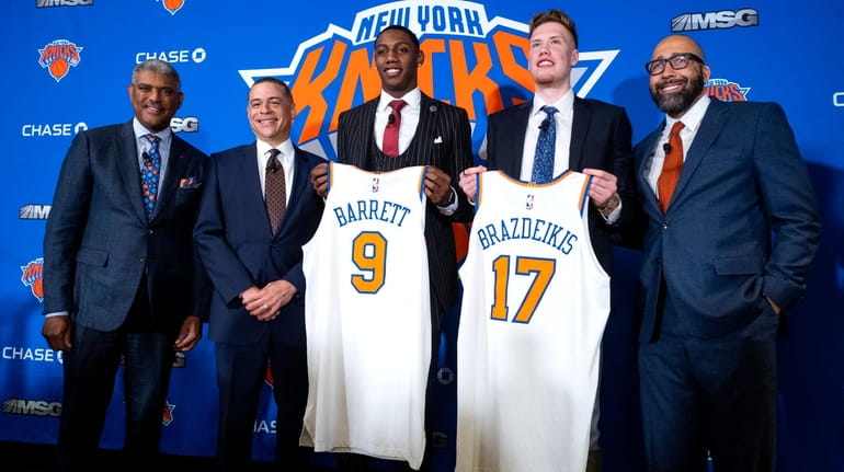 From left, Knicks president Steve Mills, GM Scott Perry, first-round...