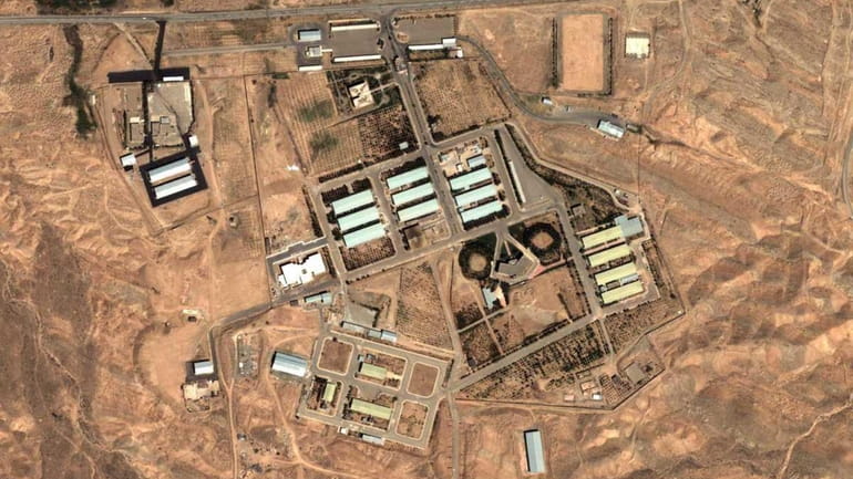 FILE - This file satellite image shows the military complex...