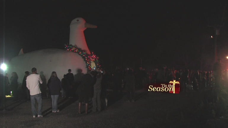 Residents gathered in Flanders tonight for the annual lighting of...