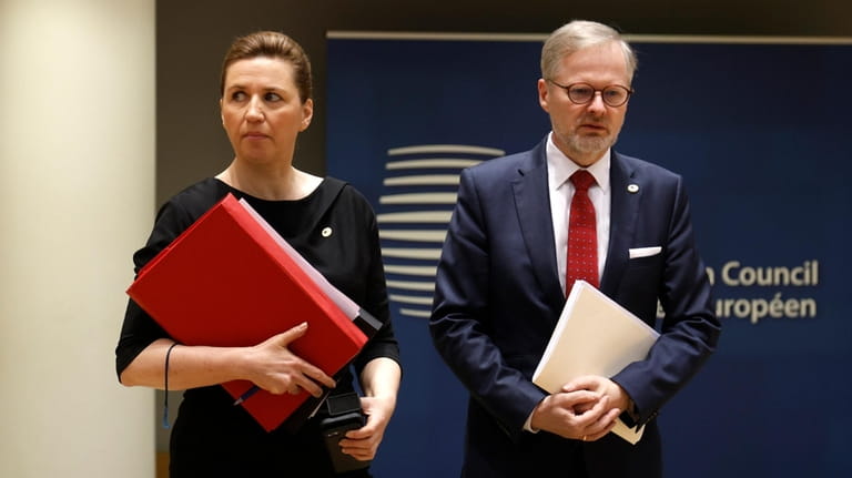 Denmark's Prime Minister Mette Frederiksen, left, and Czech Republic's Prime...
