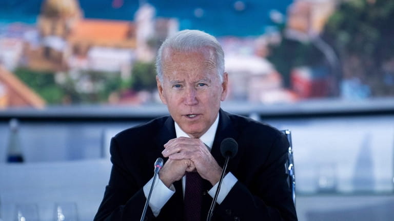 President Joe Biden speaks at the beginning of a meeting...