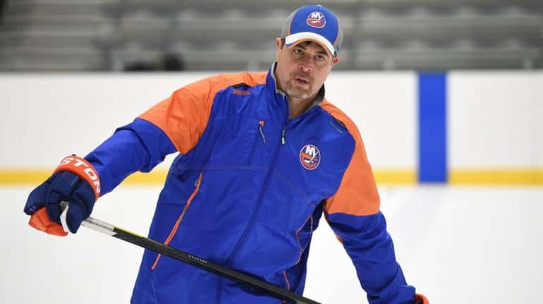 New York Islanders head coach Jack Capuano looks on during...
