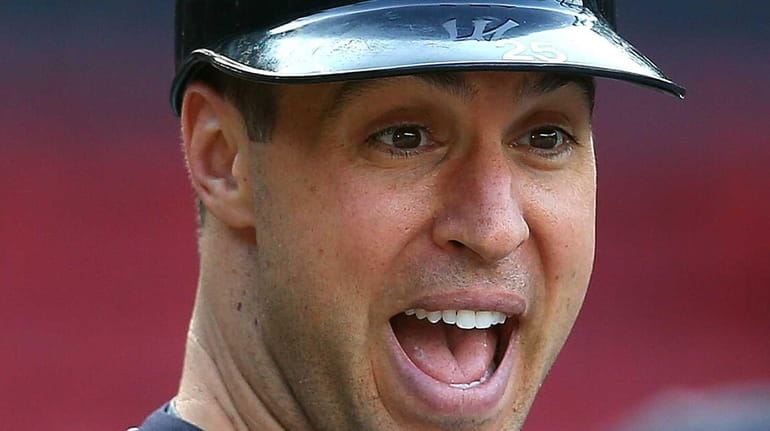 Mark Teixeira of the Yankees reacts during batting practice before...