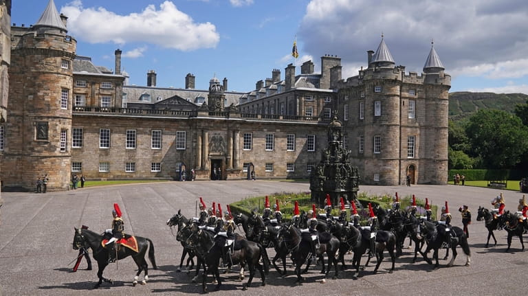 Members of the military parade at the Palace of Holyroodhouse...