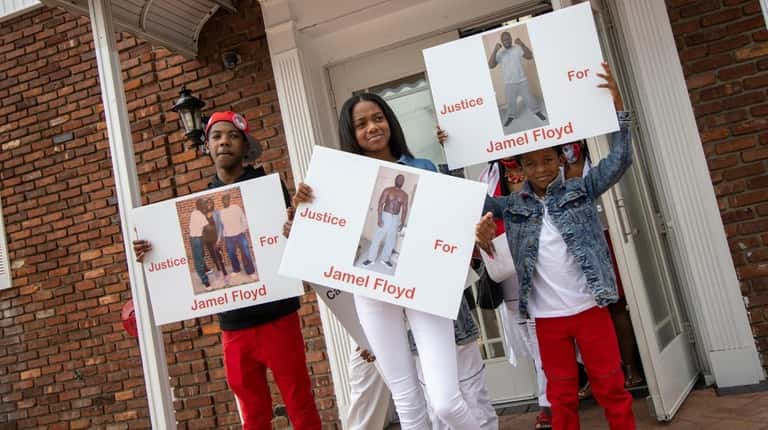 Supporters of Jamel Floyd outside the Hempstead church where family...