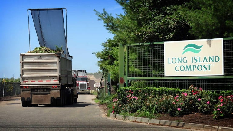 Trucks arrive at the Long Island Compost location in Yaphank...